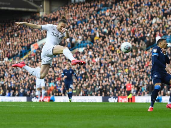 Leeds United's Luke Ayling scoring his goal of the season contender against Huddersfield Town (Pic: George Wood/Getty)