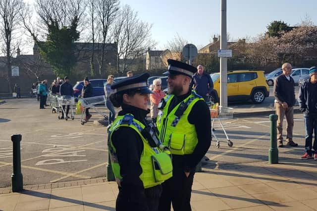 Police Community Support Officers outside Morley Morrisons (photo: West Yorkshire Police).