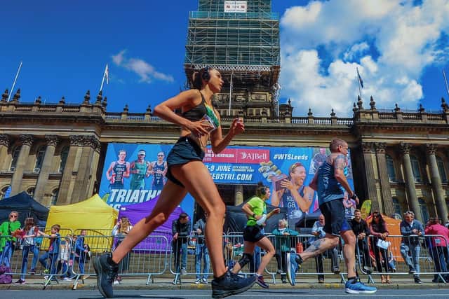 Runners pass Leeds Town Hall during the 2019 Leeds Half Marathon. Picutre: James Hardisty.