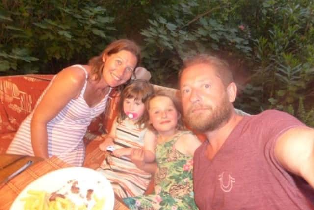 Lloyd Pinder, who has been diagnosed with advanced prostate cancer, with his wife Tina and daughters Gracie, 11, and Lola, seven.