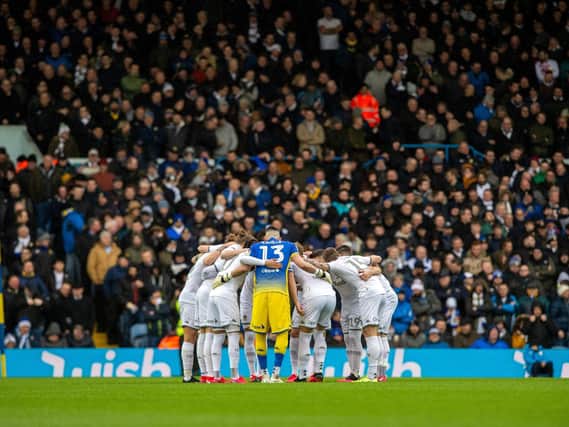 Leeds United players huddle at Elland Road. (Image@ Bruce Rollinson)