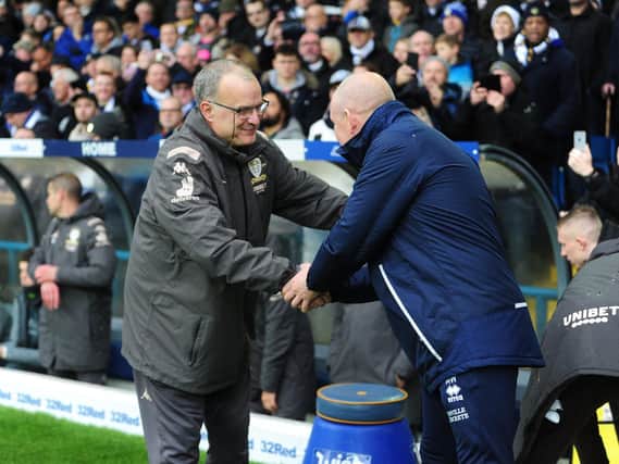 Leeds United head coach Marcelo Bielsa greets QPR boss Mark Warburton. (Image: Bruce Rollinson)