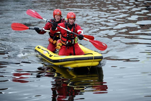 Firefighters trained in specialist water rescue techniques take part in training in Leeds. Picture: Jonathan Gawthorpe