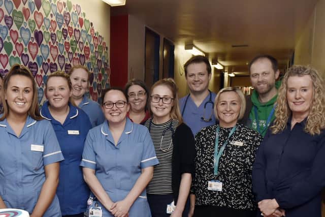 Clinical workers at the Congenital Heart Unit at Leeds General Infirmary, along with staff from the Children's Heart Surgery Fund, including CEO Sharon Milner, pictured far right. Picture: Steve Riding