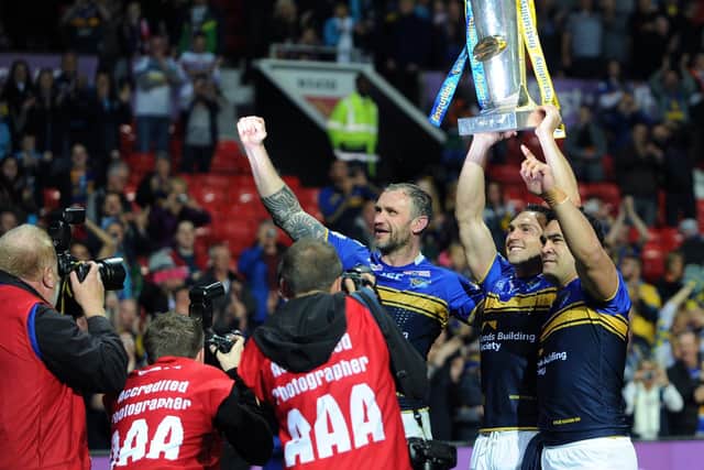 Jamie Peacock celebrates at Old Trafford in 2015, along with Kevin Sinfield and Kylie Leuluai. Picture by Jonathan Gawthorpe.
