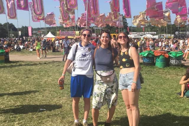 GLASTO: Leeds United fan Flora Snelson, left, at Glastonbury Festival in her Whites shirt.