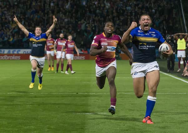 WING WIZARD: Ryan Hall outpaces Jermaine McGillvary to score Leeds Rhinos' winning try at Huddersfield which secured the League Leaders' Shield for Leeds in 2015. Picture: SWPix.com.