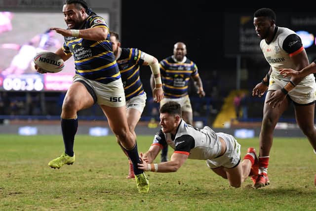 Konrad Hurrell storms over for Rhinos' final try agianst Toronto. Picture by Jonathan Gawthorpe.