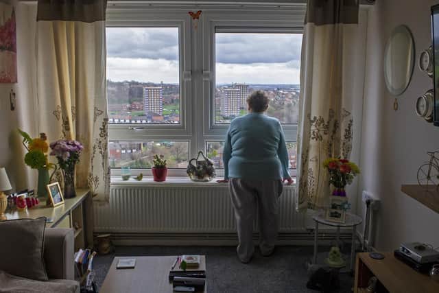 A room with a view. Sandra Ogden's living room has views for miles.