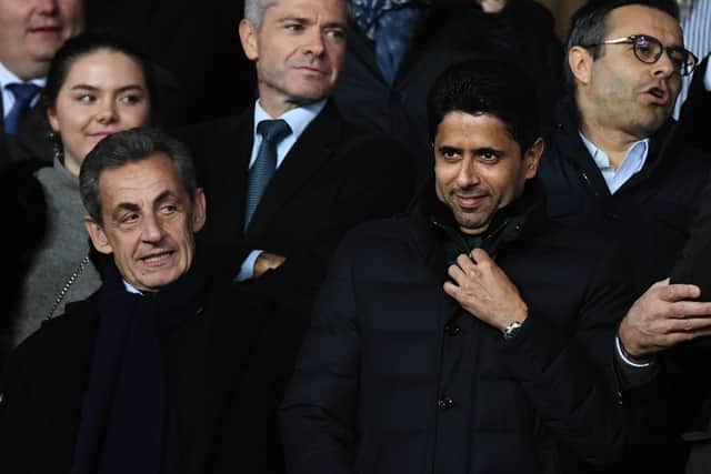 CLOSE: Leeds United chairman Andrea Radrizzzani, right, behind Paris Saint-Germain president and Qatari Sports Investment chairman Nasser al-Khelaifi as PSG take on Club Brugge last November. Photo by FRANCK FIFE/AFP via Getty Images.