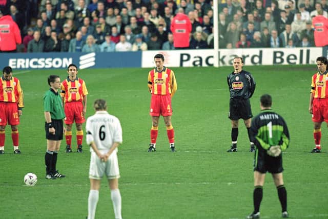 PAINFUL: Leeds United and Galatasary stand in a minute's silence in memory of Christopher Loftus and Kevin Speight before the second leg of the UEFA Cup tie at Elland Road in April 2000. Credit: Michael Steele /Allsport.