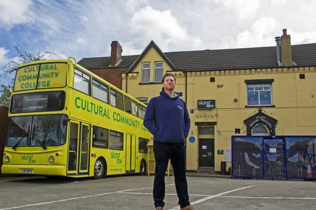 Alan Lane, artistic director of Slung Low theater, outside its community base at The Holbeck. Image: Tony Johnson