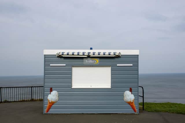 A closed ice cream stand on the deserted streets of Whitby as a result of the coronavirus pandemic. Picture: Tony Johnson.