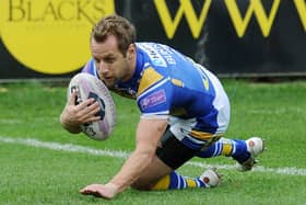 TOUCH DOWN: Rob Burrow touches down to score for Leeds Rhinos against Wakefield Trinity Wildcats in the Challenge Cup in 2014. Picture: Steve Riding.