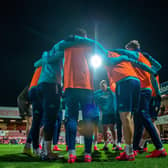 COLLECTIVE: Leeds United players pictured before the Brentford performance that turned things around. Pic: Bruce Rollinson