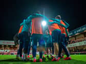 COLLECTIVE: Leeds United players pictured before the Brentford performance that turned things around. Pic: Bruce Rollinson