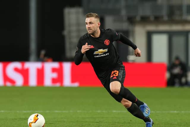 NO CHOICE: But to scrap the season if it cannot be completed says Manchester United defender Luke Shaw. Photo by Matthew Peters/Manchester United via Getty Images.