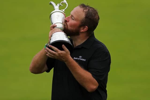 Shane Lowry celebrates winning the Claret Jug and The 2019 Open Championship at Royal Portrush Golf Club. Picture: Niall Carson/PA