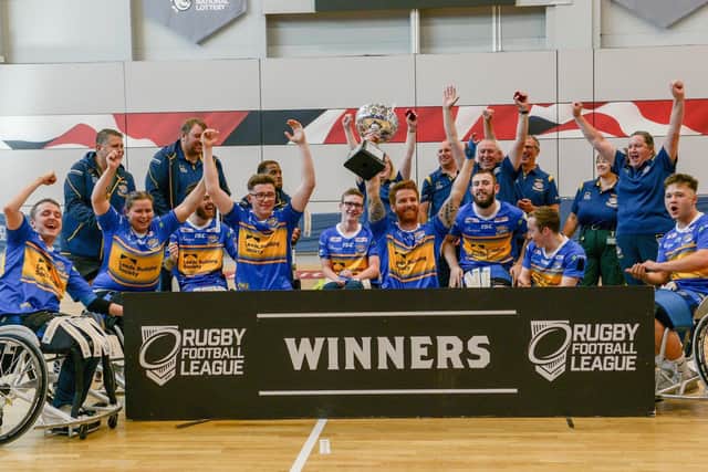 CHAMPIONS: Leeds Rhinos celebrate their 2019 Wheelchair Challenge Cup final triumph. Picture: Dean Atkins/SWpix.com