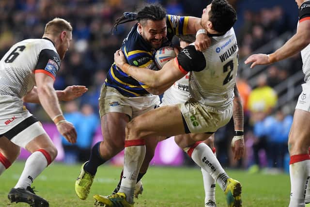 Konrad Hurrell takes on Sonny Bill Williams during Rhinos' win over Toronto last month. Picture by Jonathan Gawthorpe.
