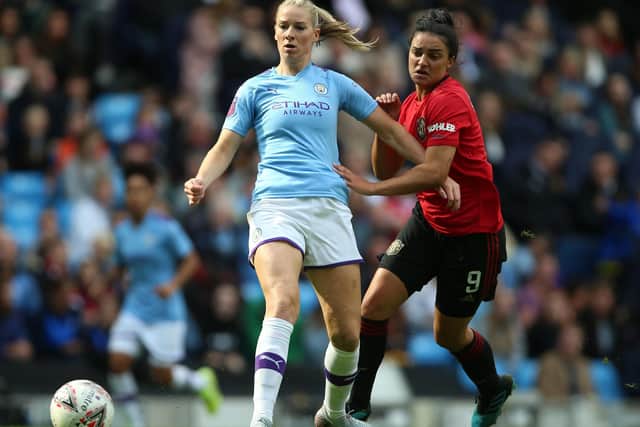 Manchester City Gemma Bonner (left) and Manchester United Jess Sigsworth battle for the ball. Picture: PA.