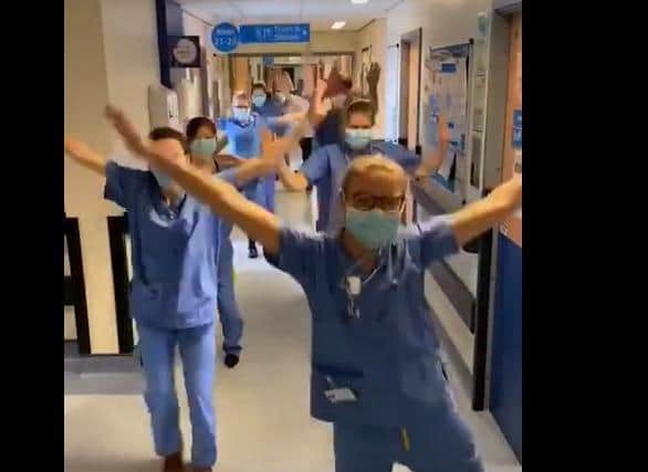 Frontline NHS staff fighting Covid-19 dancing on TikTok app to boost morale.