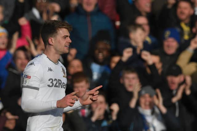 ON HOLD: Leeds United striker Patrick Bamford celebrates his 13th strike of the season in last month's 2-0 win at home to Huddersfield Town - which remains the Whites' most recent game and goal. Photo by George Wood/Getty Images.