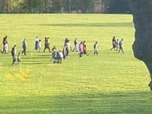The pictures show a large group of people on Harehills Park