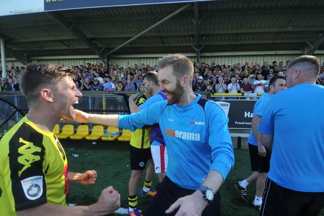 MAGIC MOMENT: Harrogate Town's manager Simon Weaver celebrates after winning promotion to the National League in 2018. Picture: Tony Johnson.