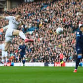 HAVE THAT: Leeds United defender Luke Ayling slams home his majestic volley against Huddersfield Town. Photo by George Wood/Getty Images.