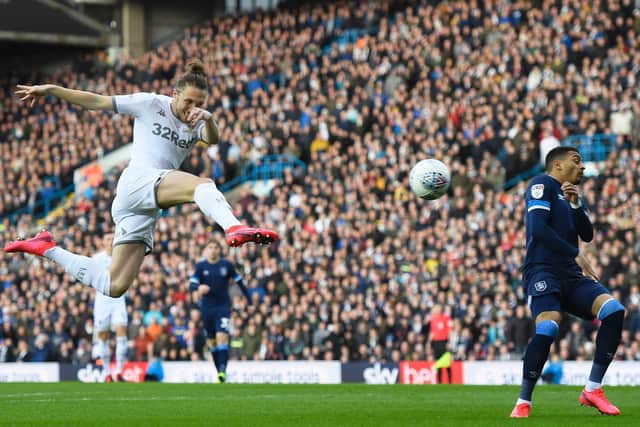 HAVE THAT: Leeds United defender Luke Ayling slams home his majestic volley against Huddersfield Town. Photo by George Wood/Getty Images.