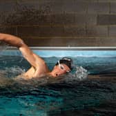 This is double Olympic champion Alistair Brownlee swimming...in his garage.