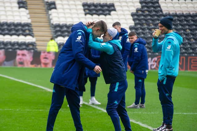 MISCHIEF: Gjanni Alioski getting Illan Meslier in a Muay Thai clinch at Elland Road. Photo: Tony Johnson