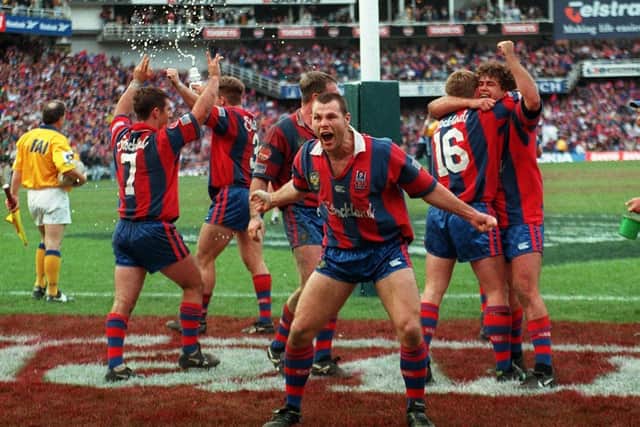 WINNING FEELING: Lee Jackson celebrates winning the 1997 NRL Grand Final with Newcastle Knights. Picture: NRL Photos.
