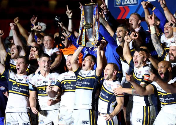 Danny McGuire lifts the Super League trophy after Leeds Rhinos' victory over Castleford Tigers in the 2017 GRand Final. Picture:Michael Steele/Getty Images.