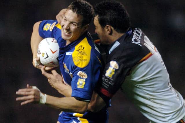 Danny McGuire is tackled during the 2004 Grand Final. Picture: Steve Riding.