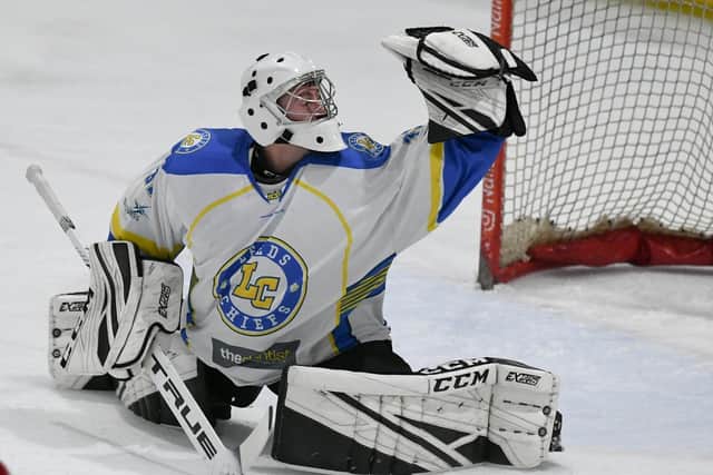 I'LL HAVE THAT:  Leeds Chiefs' netminder Sam Gospel  makes a glove save against Swindon Wildcats. Picture courtesy of gw-images.com