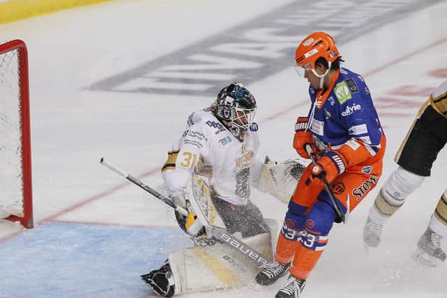 Sam Gospel comes under pressure from Sheffield Steelers' Jordan Owens while in net for nottingham Panthers. Picture courtesy of Dean Woolley.