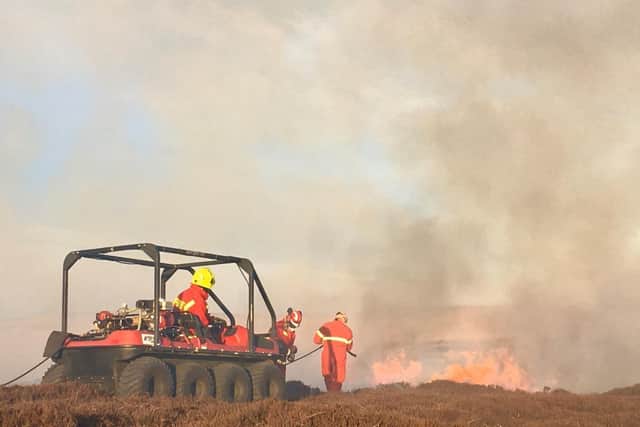 Firefighters battling a moorland fire off Turvin Road in Calderdale, as the fire service issues a warning to the public. Picture: WYFRS