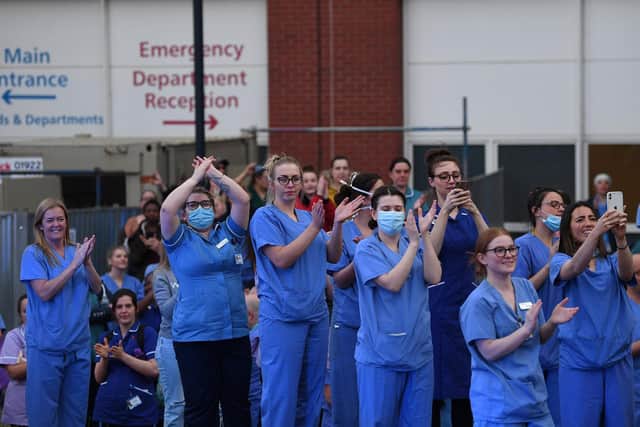 NHS staff join the nationwide tribute to key workers.