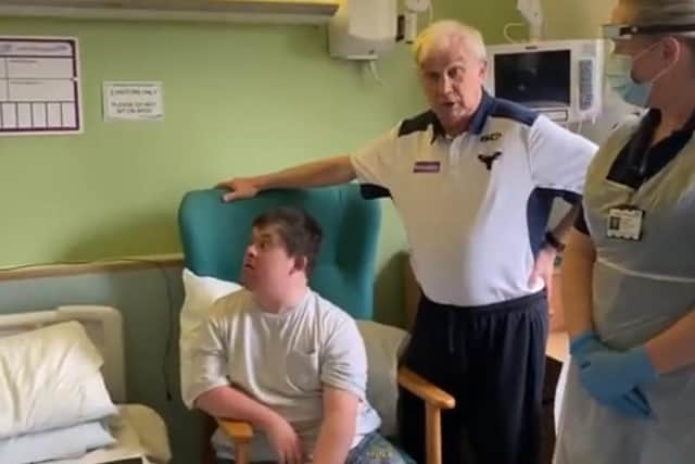Ben and his step dad Neil in hospital cc Karen Dawber