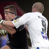 LAST-ING MEMORY: Luke Gale played against Andy Last, left, towards the end of the Hull hooker's career.