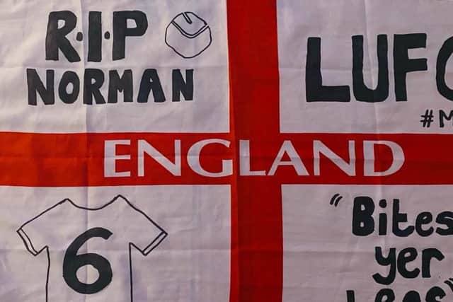 DEDICATION; Sixteen-year-old Leeds United fan Ollie Whitfield's flag for Norman Hunter - which was taken on a 13-mile walk to be put up at Elland Road.