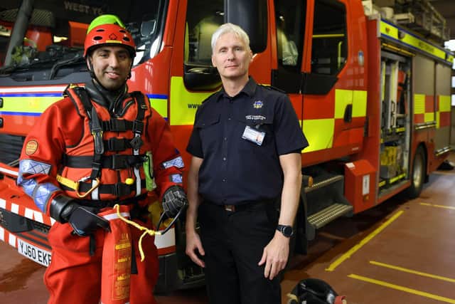Firefighter Hassan Abrar  and crew manager Frank McNeill are part of the specialist water rescue team based at Leeds Fire Station. Picture: Gary Longbottom