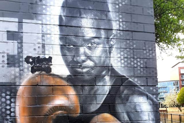 Emma covered over the racist language next to the image of Nicola Adams (photo: Emma Ross).