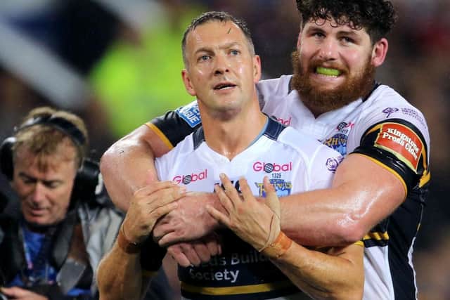 Grand Final joy for Danny McGuire and teammate Mitch Garbutt. Picture by Richard Sellars/PA