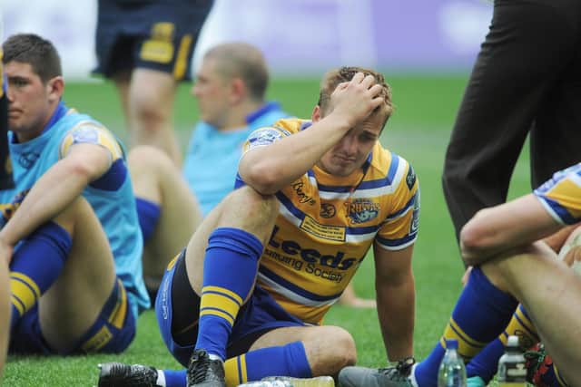Lee Smith can't hide his dismay after Leeds' 2012 Cup final loss to Warrington Wolves. Picture by Steve Riding.