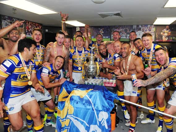Rhinos celebrate their 2014 Challenge Cup final victory over Castleford Tigers. Picture by Steve Riding.