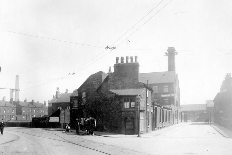 Nippet Lane. On the left is a fish and chip shop. To the right is St Stephen's Road with a pickle factory seen centrally. The houses in the distance are on Torre Road where Burmantofts pottery and brick factory was sited.