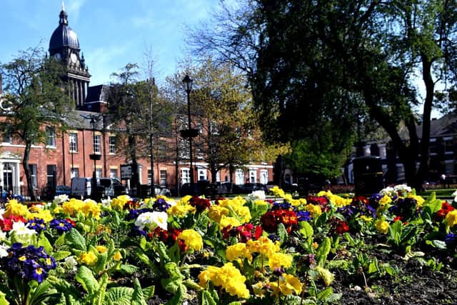 A deserted Park Square in Leeds city centre as the lockdown looks to continue for a further three weeks a flower bed of Spring flowers stand out with Leeds Town Hall behind. (Image: Gary Longbottom)